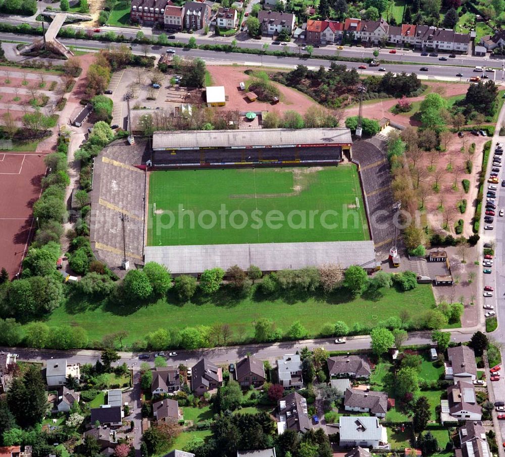 Aachen from the bird's eye view: Blick auf das Tivoli, es ist als Fußballstadion in Aachen Austragungsort für Fußballspiele und Heimstadion von Alemannia Aachen. Das erste Stadion an der heutigen Stelle in Aachen wurde bereits 1928 eröffnet; der heutige Tivoli fasst 21.300 Zuschauer und bietet 3.700 Sitzplätze und 17.600 Stehplätze. Der Tivoli liegt in der Soers am nördlichen Rand der Innenstadt an der Krefelder Straße (B 57), unweit der A 4. Der Name des Stadions stammt von dem nordwestlich des Lousbergs gelegenen, früheren großen „Gut Tivoli“, dessen Park an die Gärten des italienischen Ortes Tivoli erinnerte.