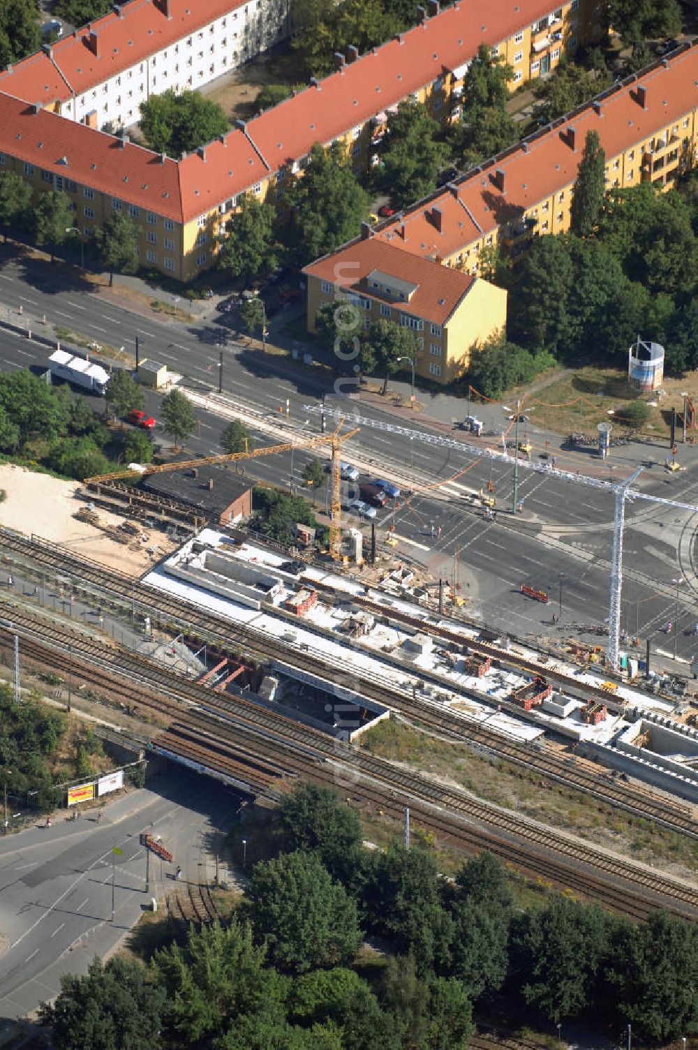 Berlin from the bird's eye view: Blick auf die Umbauarbeiten am S-Bahnhof Adlershof in Berlin-Köpenick. Diese Arbeiten dauern seit Juli 2006 und werden 2010 abgeschlossen sein. Die vorhandenen Brücken, Empfangshallen, Aufgänge und Bahnsteige in Adlershof werden dabei vollständig durch Neubauten ersetzt. Bauherr: Deutsche Bahn AG