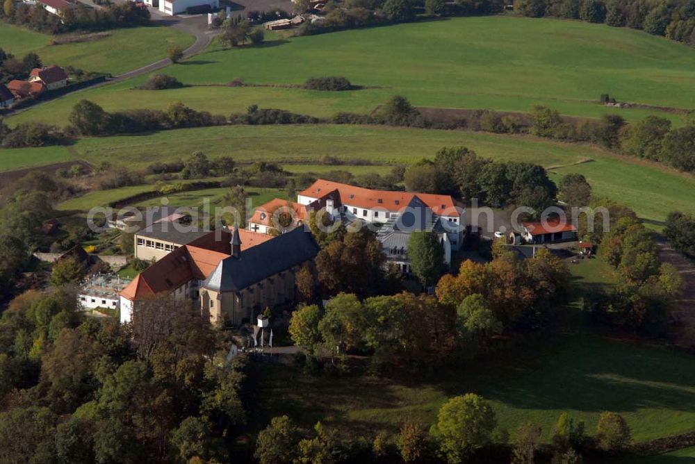 Bad Brückenau from the bird's eye view: Blick auf den Volkersberg mit dem Haus Volkersberg - eine katholische Landvolkshochschule und Jugenbildungstätte, der Wallfahrtskirche und dem Franziskanerkloster. Kontakt: Haus Volkersberg, 97769 Bad Brückenau/Volkers; Tel: 09741-9132-00