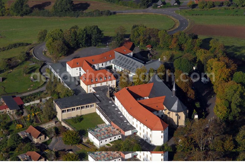 Bad Brückenau from the bird's eye view: Blick auf den Volkersberg mit dem Haus Volkersberg - eine katholische Landvolkshochschule und Jugenbildungstätte, der Wallfahrtskirche und dem Franziskanerkloster. Kontakt: Haus Volkersberg, 97769 Bad Brückenau/Volkers; Tel: 09741-9132-00