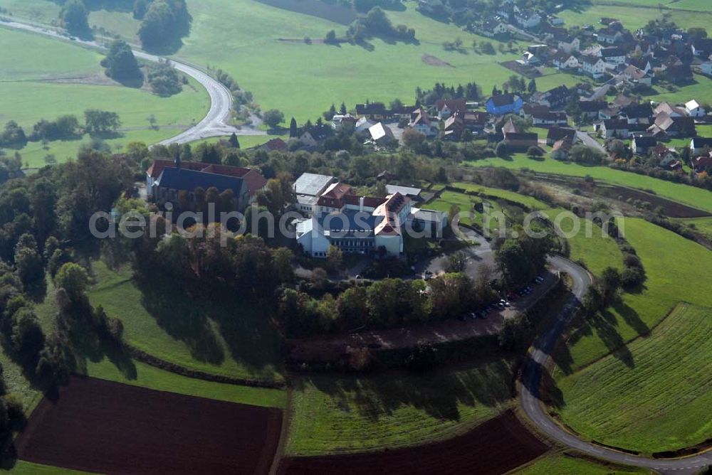 Bad Brückenau from the bird's eye view: Blick auf den Volkersberg mit dem Haus Volkersberg - eine katholische Landvolkshochschule und Jugenbildungstätte, der Wallfahrtskirche und dem Franziskanerkloster. Kontakt: Haus Volkersberg, 97769 Bad Brückenau/Volkers; Tel: 09741-9132-00