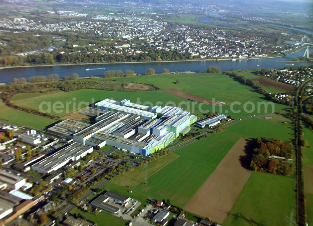 Aerial photograph Andernach (Rheinland-Pfalz) - Rund 2.400 Mitarbeiter produzieren jährlich etwa 1 Millionen Tonnen Weißblech – für die unterschiedlichsten Verwendungszwecke und Branchen. Weltweit vertrauen rund 400 Kunden in über 80 Ländern auf die Produkte aus Andernach in Rheinland-Pfalz. Rasselstein ist ein Tochterunternehmen der ThyssenKrupp Steel AG. Rasselstein GmbH Koblenzer Straße 141; 56626 Andernach ;Telefon: (0 26 31) 81-0 Telefax: (0 26 31)81-2903