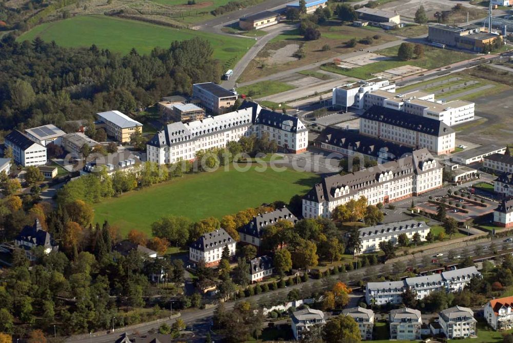 Aerial image Wetzlar - Wetzlar, ehemals Reichsstadt und Sitz des Reichskammergerichts, ist die Kreisstadt des Lahn-Dill-Kreises und zugleich ein wirtschaftliches und kulturelles Zentrum sowie der herausragende Industriestandort in Mittelhessen. Das Stadtgebiet liegt in Höhe der Dillmündung in die Lahn.Im Vordergrund CompetenceCenter Duale Hochschulstudienstudium e.V.; Charlotte-Bamberg-Str. 3; 06441 44786 ; Verkehrsinstitut Michel GmbH; Charlotte-Bamberg-Str. 4; 0644167927; Stadtverwaltung: Ernst-Leitz-Straße 30; 35578 Wetzlar; Webpräsenz: