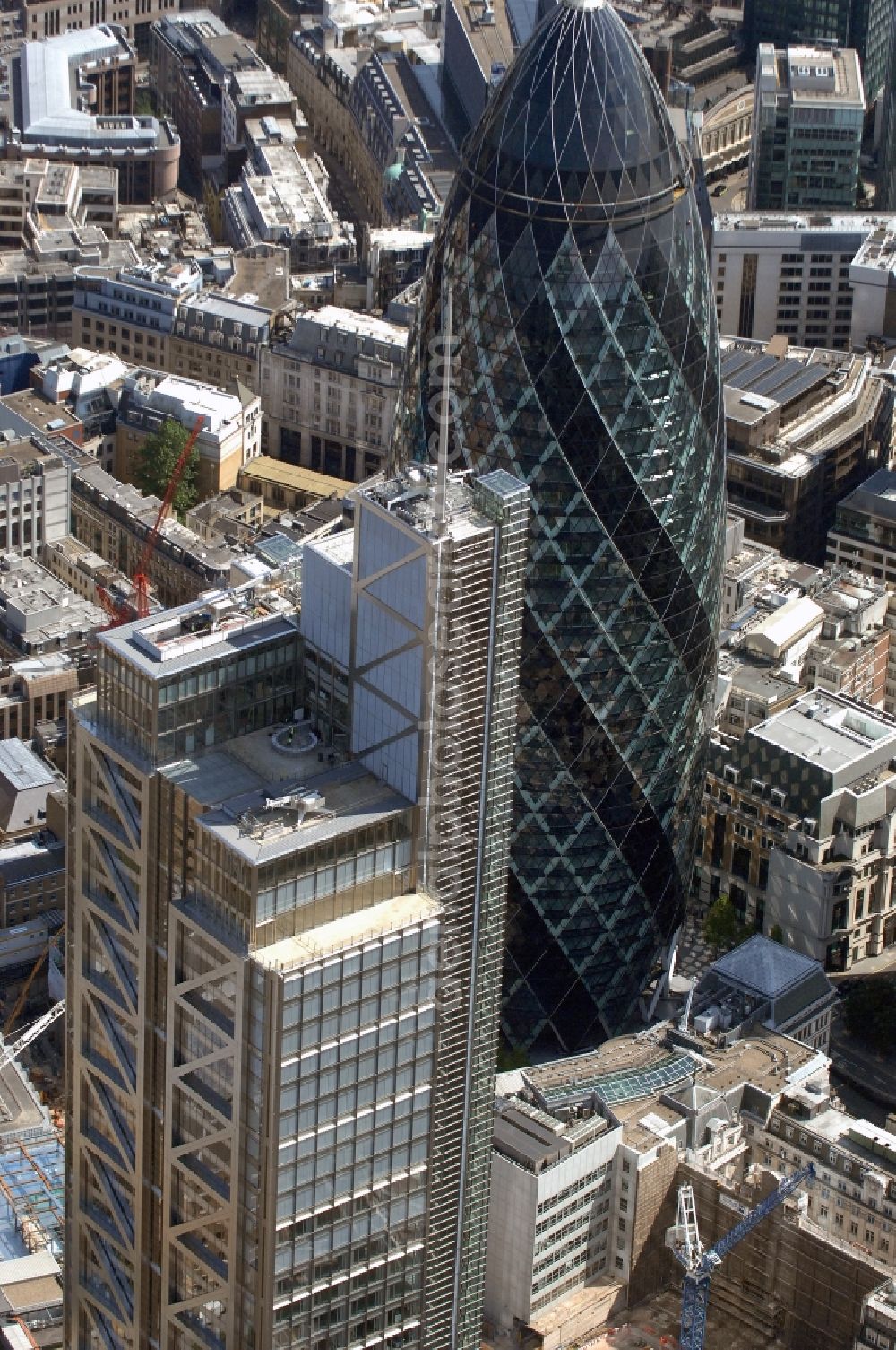 Aerial photograph London - View of the Heron Tower skyscraper in London. The skyscraper with office space, which is also known as 110 Bishopsgate, is 202 meters high, making it the second-tallest building in London and the tallest building in the City of London. It is placed across from the skyscraper 30 St Mary Axe and was built from 2008 to 2011 under the direction of Heron International and under the planning of Kohn Pederson Fox Architects