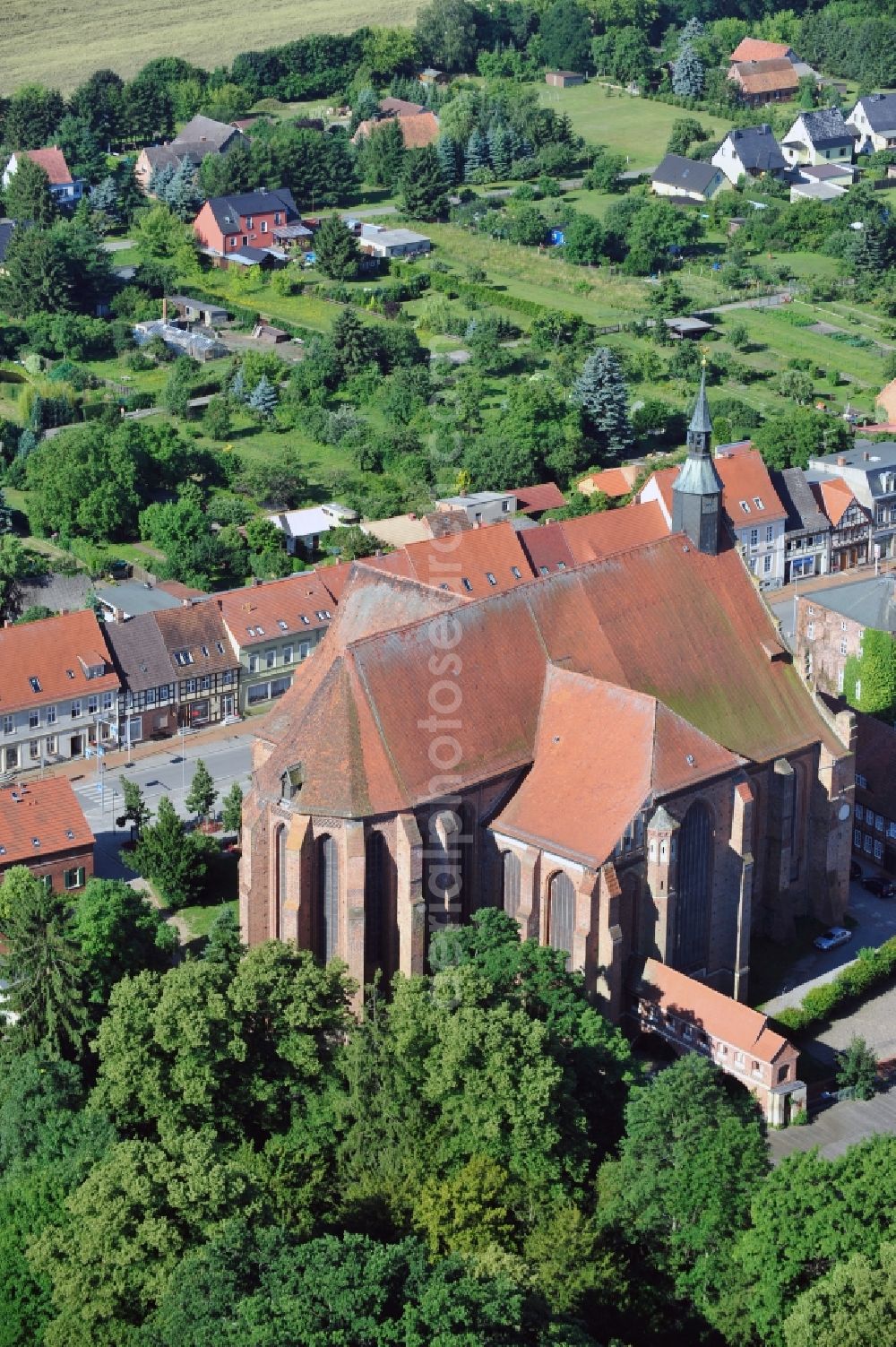 Bad Wilsnack from the bird's eye view: View of the church Wunderblutkirche St. Nicholas in Bad Wilsnack in Brandenburg. The church, which was completed in 1525, is the landmark of the city and was the most famous pilgrimage destination in Northern Europe