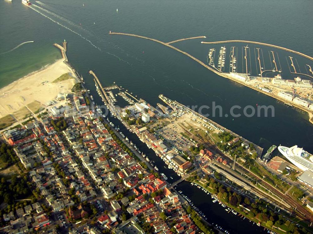 Rostock - Warnemünde from above - Der Yachthafen Hohe Düne.750 Motorboote und Yachten bis zu einem Tiefgang von 4 m können im neuen Yachthafen Hohe Düne anlegen. Maritime Service GmbH, Hohe Düne / Am Yachthafen 1-8; D-18119 Rostock-Warnemünde; Fax +49 (0) 381 / 50 40 - 80 99; E-Mail service@yachthafen-hohe-duene.de;