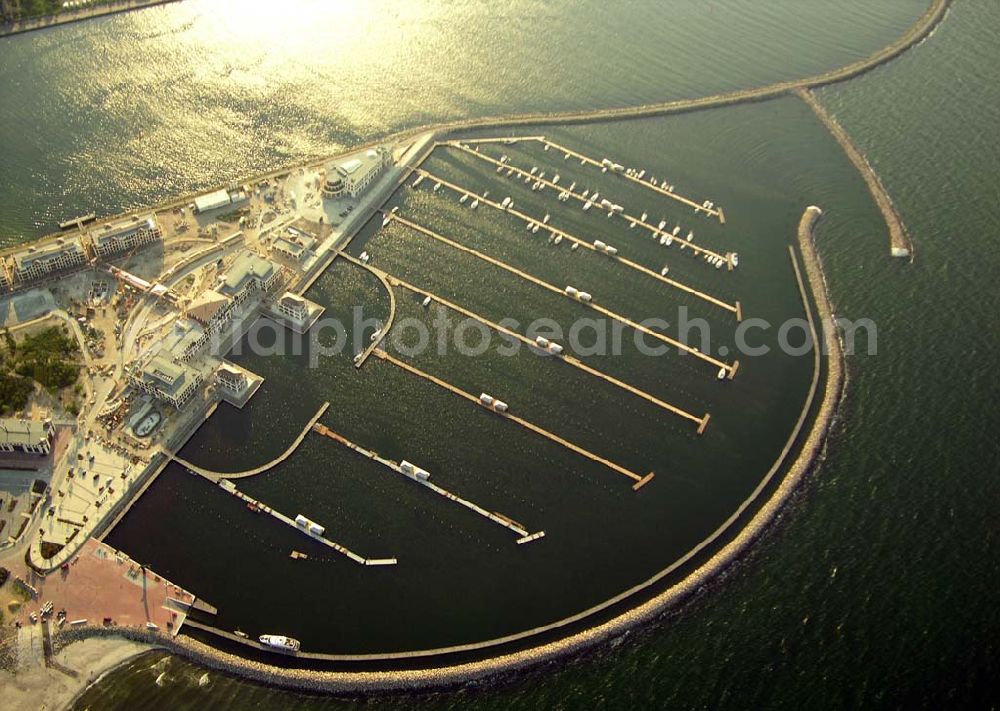 Aerial photograph Rostock - Warnemünde - Der Yachthafen Hohe Düne.750 Motorboote und Yachten bis zu einem Tiefgang von 4 m können im neuen Yachthafen Hohe Düne anlegen. Maritime Service GmbH, Hohe Düne / Am Yachthafen 1-8; D-18119 Rostock-Warnemünde; Fax +49 (0) 381 / 50 40 - 80 99; E-Mail service@yachthafen-hohe-duene.de;