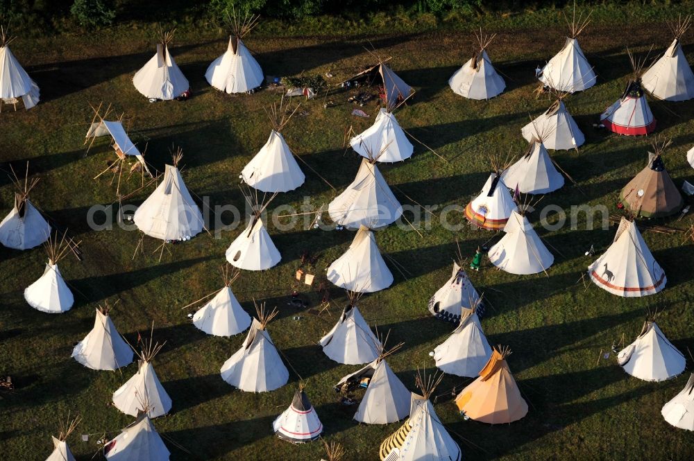 Seddiner See from above - View of a tent camp in the district Kähnsdorf of the municipality Seddiner See in Brandenburg. The Indians meeting the Week found by the German Indianistikbund took place with about 1,000 Indians fans on a field. The participants ,who spent the nights in tipis, presented adjusted the lives of the Indians for ten days