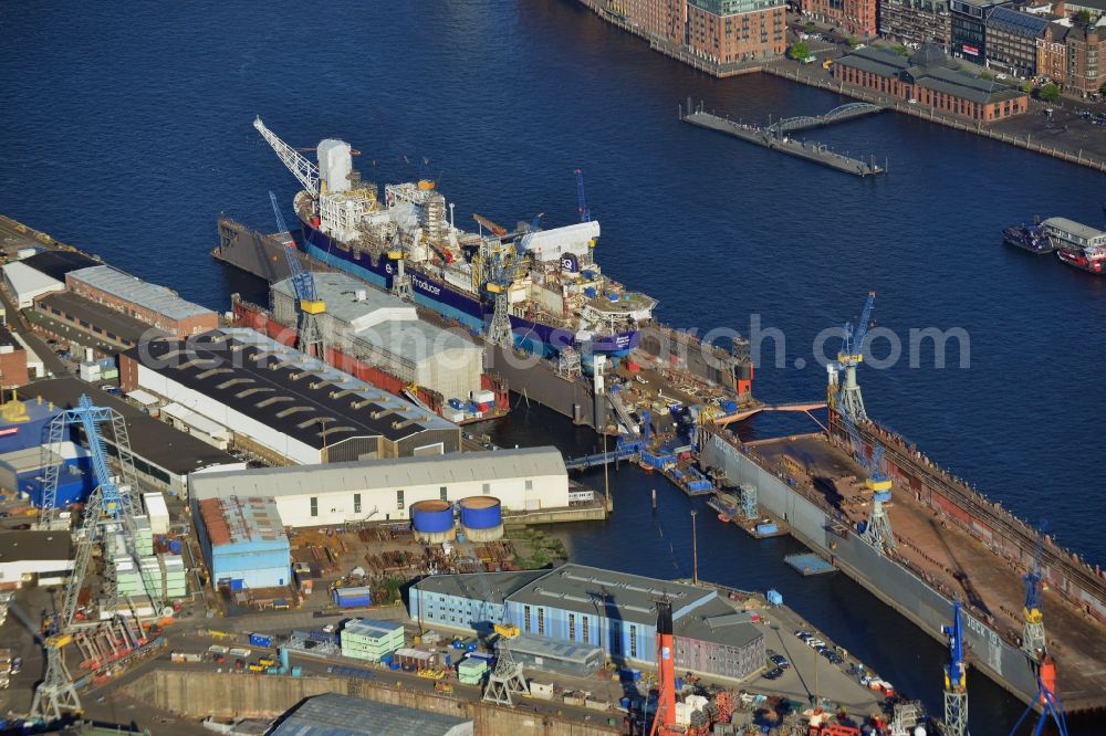 Hamburg from above - Blohm + Voss dockyard in the port of Hamburg. The shipyard is an operational part of ThyssenKrupp Marine System AG