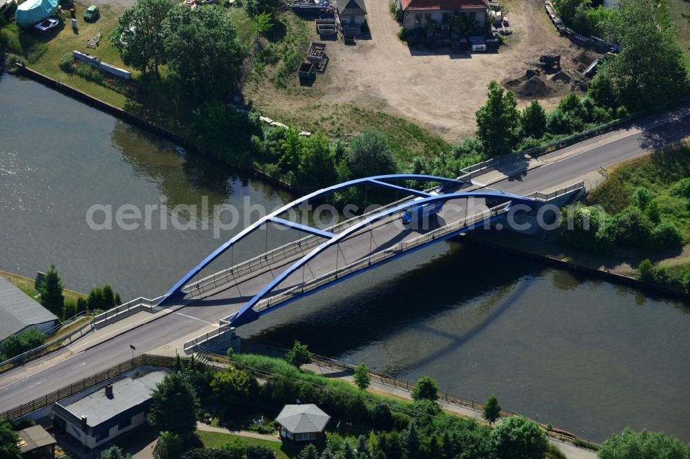 Burg (bei Magdeburg) from above - Blumenthal bridge over the Elbe-Havel-Kanal in the North of the town of Burg (bei Magdeburg) in the state of Saxony-Anhalt. The distinct blue arc bridge spans the canal in the North of the town. The bridge is surrounded by a residential area on the edge of the town