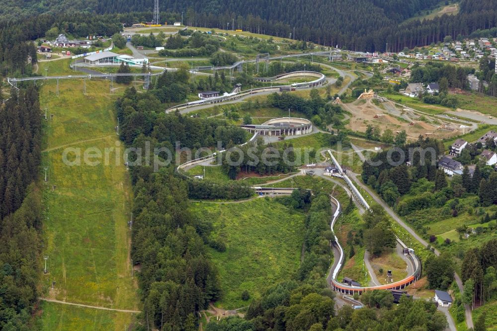 Winterberg from the bird's eye view: View at the bobsleigh and luge track in Winterberg in the federal state North Rhine-Westphalia. Operator is the recreation and sports center Winterberg GmbH