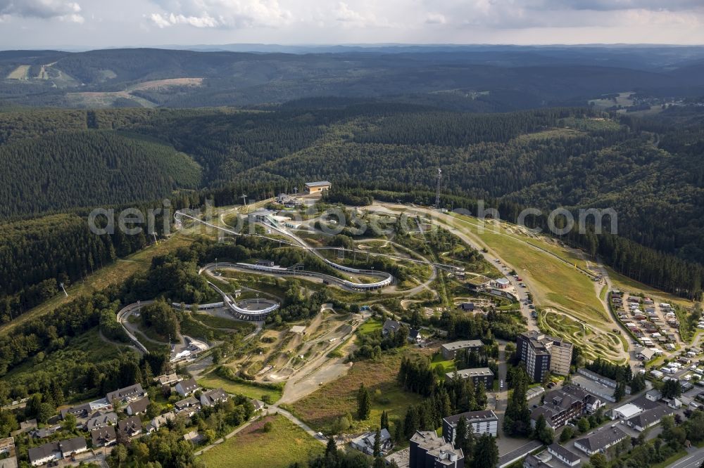 Winterberg from above - View at the bobsleigh and luge track in Winterberg in the federal state North Rhine-Westphalia. Operator is the recreation and sports center Winterberg GmbH