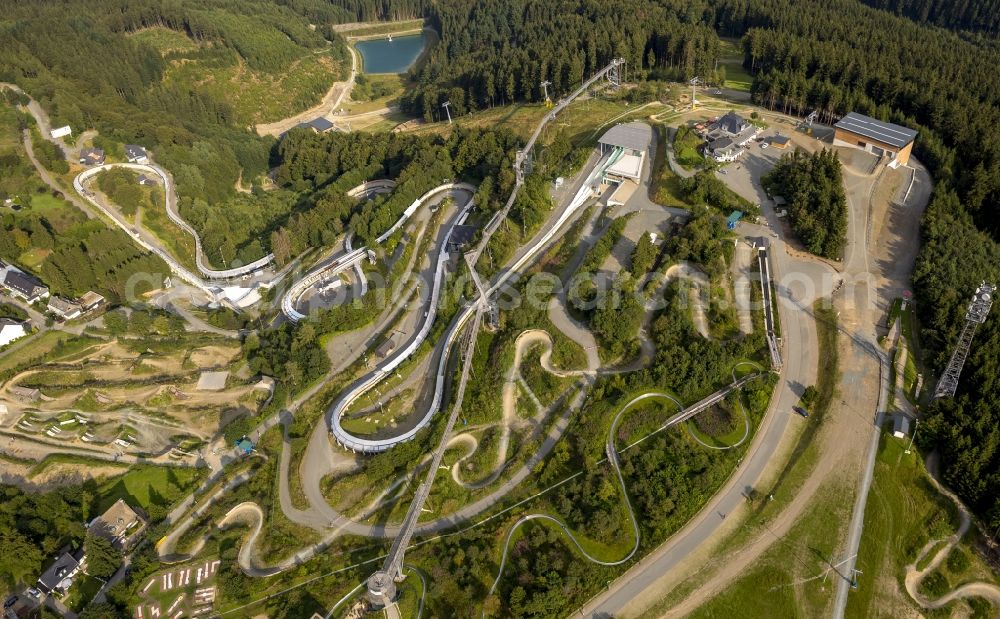 Aerial photograph Winterberg - View at the bobsleigh and luge track in Winterberg in the federal state North Rhine-Westphalia. Operator is the recreation and sports center Winterberg GmbH