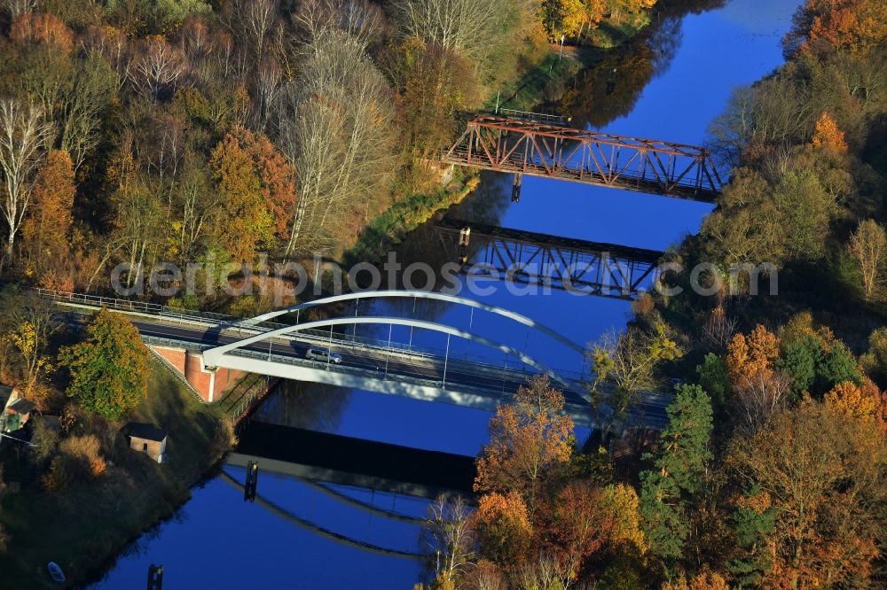 Liebenwalde from above - Bridge with two-lane roadway of the Berliner Chaussee. In the background an old disused railway bridge. The bridges across the Oder-Havel-Kanal in Liebenwalde in the state of Brandenburg