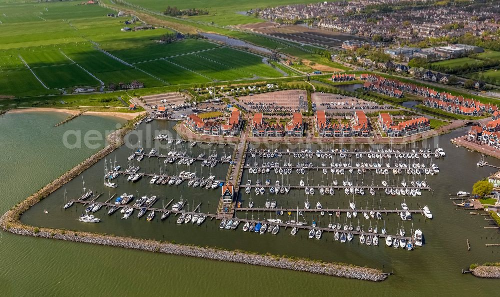 Katwoude from the bird's eye view: Boat dock and marina on the coast to Hoorn's hop from Katwoude in Holland - Netherlands