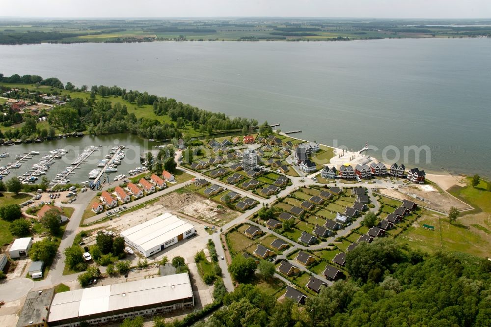 Rechlin from the bird's eye view: Boat mooring in Claassee in Rechlin in Mecklenburg-Vorpommern. In addition to Wolfgang Gerbere boats the docks are also used by the houseboat rental company HAPIMAG