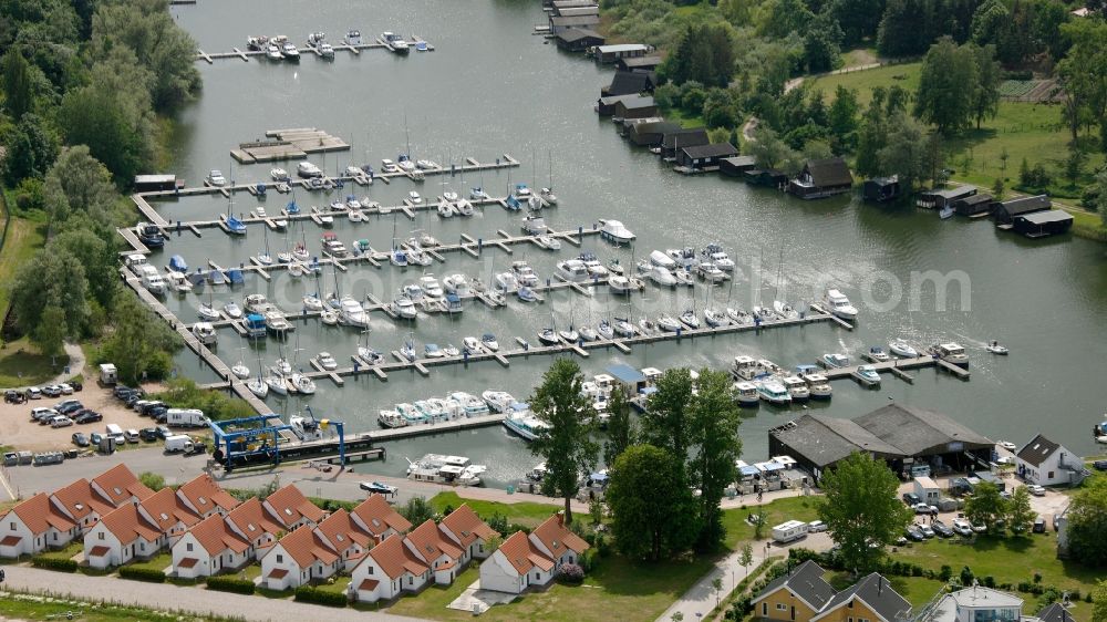 Aerial photograph Rechlin - Boat mooring in Claassee in Rechlin in Mecklenburg-Vorpommern. In addition to Wolfgang Gerbere boats the docks are also used by the houseboat rental company HAPIMAG