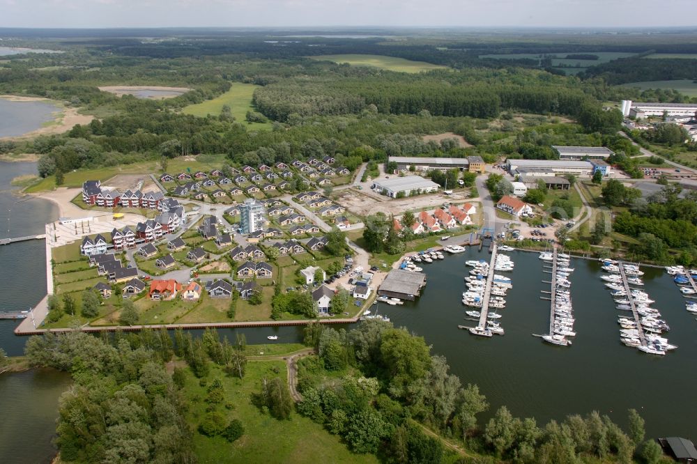 Aerial photograph Rechlin - Boat mooring in Claassee in Rechlin in Mecklenburg-Vorpommern. In addition to Wolfgang Gerbere boats the docks are also used by the houseboat rental company HAPIMAG