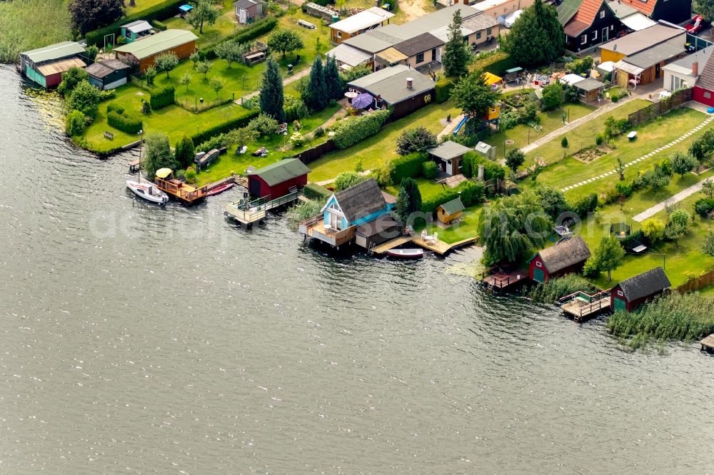 Krakow am See from above - Boat House ranks with the recreational marine jetties and boat mooring area on the banks of lake Krakower See in Krakow am See in the state Mecklenburg - Western Pomerania