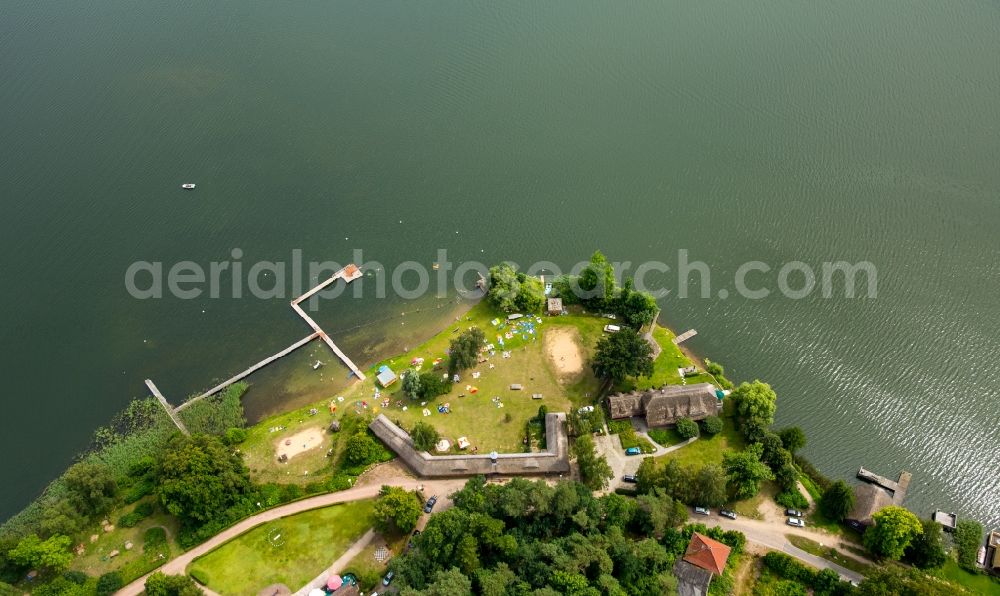 Aerial image Krakow am See - Boat House ranks with the recreational marine jetties and boat mooring area on the banks of lake Krakower See in Krakow am See in the state Mecklenburg - Western Pomerania