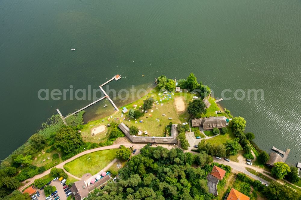 Aerial photograph Krakow am See - Boat House ranks with the recreational marine jetties and boat mooring area on the banks of lake Krakower See in Krakow am See in the state Mecklenburg - Western Pomerania