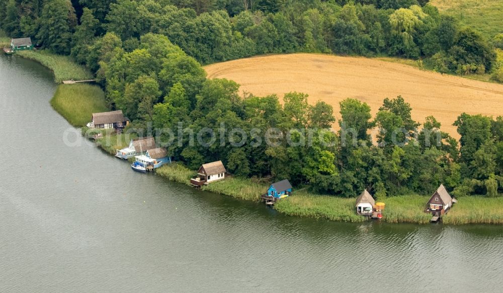 Krakow am See from above - Boat House ranks with the recreational marine jetties and boat mooring area on the banks of lake Krakower See in Krakow am See in the state Mecklenburg - Western Pomerania