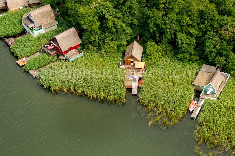 Krakow am See from above - Boat House ranks with the recreational marine jetties and boat mooring area on the banks of lake Krakower See in Krakow am See in the state Mecklenburg - Western Pomerania