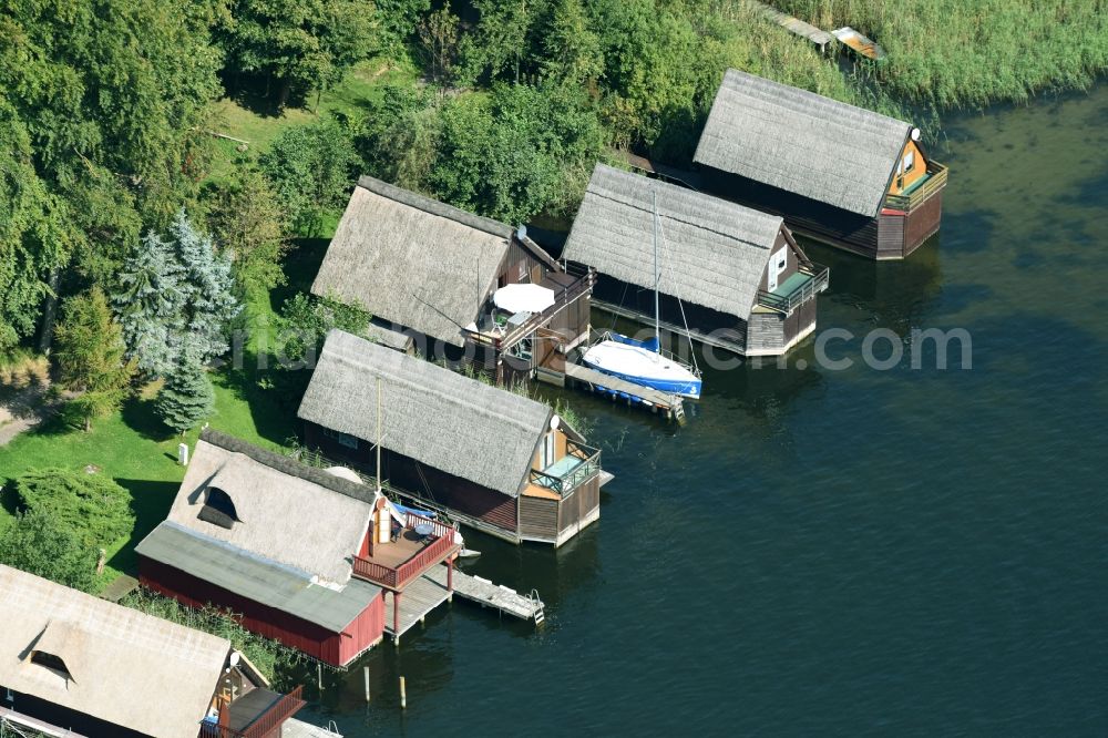 Malchow from above - Boat House ranks with the recreational marine jetties and boat mooring area on the banks Petersdorfer See in Malchow in the state Mecklenburg - Western Pomerania