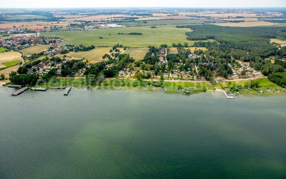 Plau am See from the bird's eye view: Boat House ranks with the recreational marine jetties and boat mooring area on the banks on Plauer See in Plau am See in the state Mecklenburg - Western Pomerania