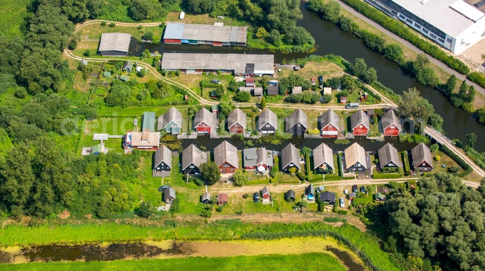 Malchin from above - Boat Houses with gardens on the banks of the Peene - sewer in Malchin in the state Mecklenburg - Western Pomerania