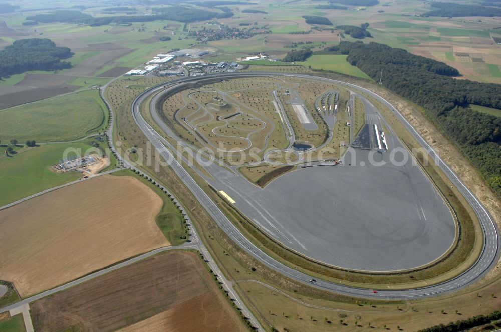 BOXBERG from the bird's eye view: Die Robert Bosch GmbH betreibt im Boxberger Ortsteil Windischbuch eine 94 ha große Teststrecke im Gewerbegebiet Seehof. Boxberg ist eine badische Stadt im Main-Tauber-Kreis im Nordosten des Landes Baden-Württemberg. Robert Bosch GmbH Prüfzentrum Boxberg, Robert Bosch Strasse 25 ,97944 Boxberg-Windischbuch Tel.: (07930) 600-210