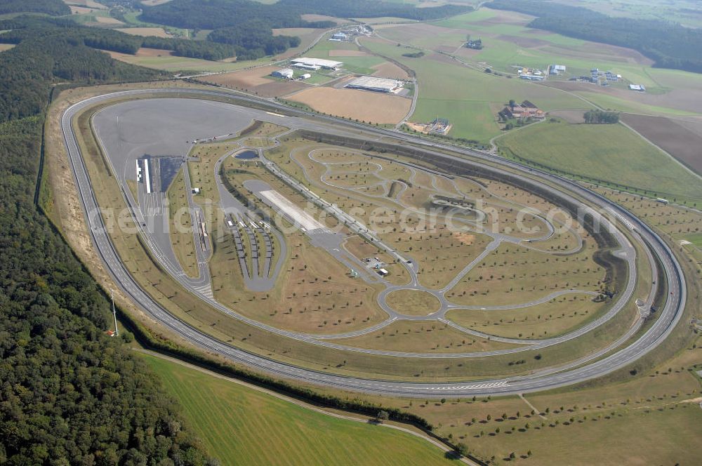 Aerial photograph BOXBERG - Die Robert Bosch GmbH betreibt im Boxberger Ortsteil Windischbuch eine 94 ha große Teststrecke im Gewerbegebiet Seehof. Boxberg ist eine badische Stadt im Main-Tauber-Kreis im Nordosten des Landes Baden-Württemberg. Robert Bosch GmbH Prüfzentrum Boxberg, Robert Bosch Strasse 25 ,97944 Boxberg-Windischbuch Tel.: (07930) 600-210