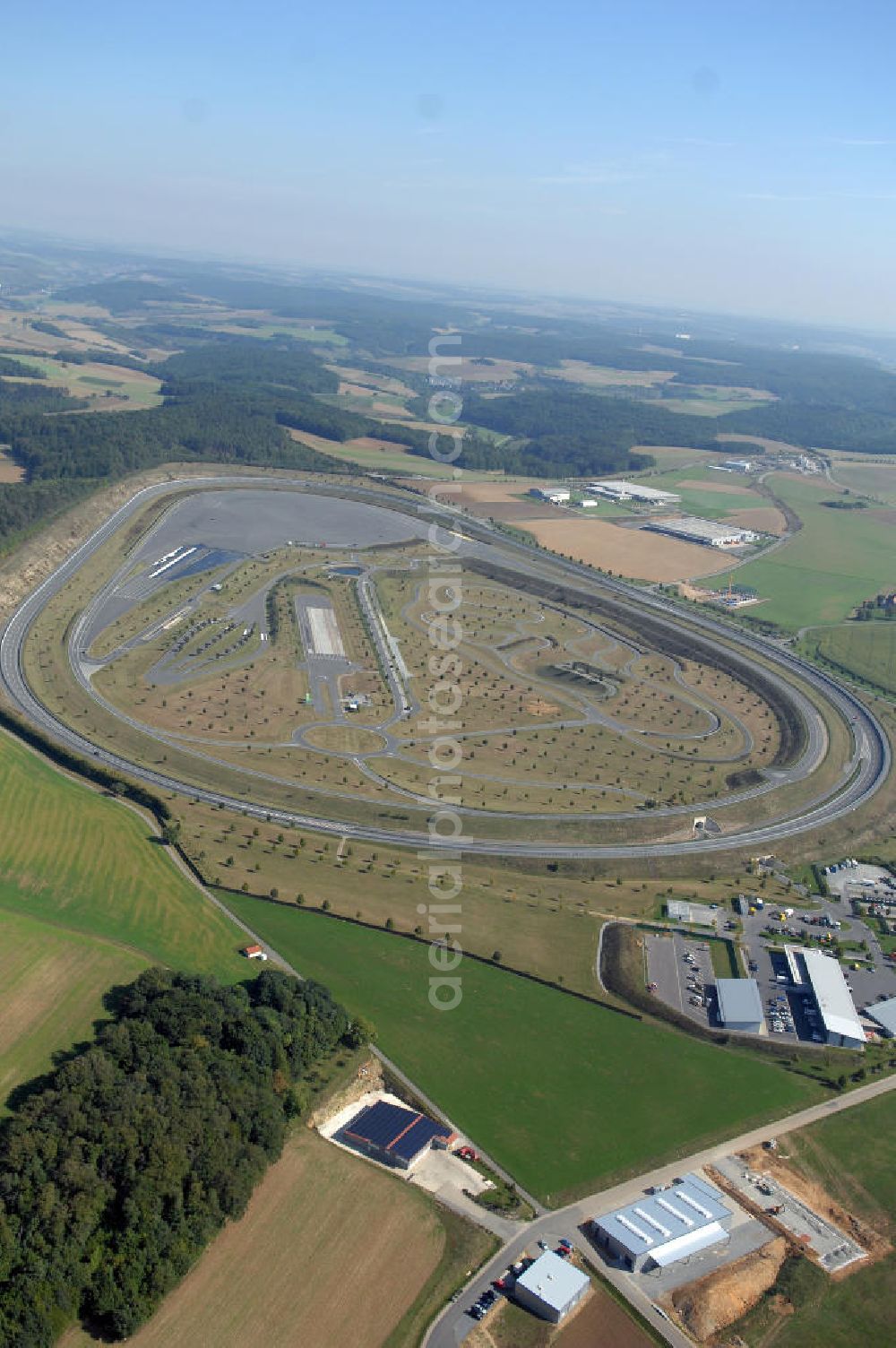 BOXBERG from the bird's eye view: Die Robert Bosch GmbH betreibt im Boxberger Ortsteil Windischbuch eine 94 ha große Teststrecke im Gewerbegebiet Seehof. Boxberg ist eine badische Stadt im Main-Tauber-Kreis im Nordosten des Landes Baden-Württemberg. Robert Bosch GmbH Prüfzentrum Boxberg, Robert Bosch Strasse 25 ,97944 Boxberg-Windischbuch Tel.: (07930) 600-210