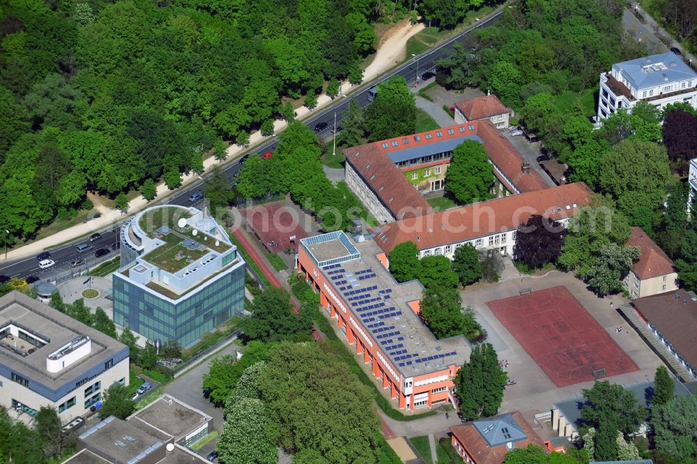 Aerial image Berlin - Is the building of the Embassy of the Kingdom of Saudi Arabia at the Tiergarten street, right in the Tiergarten in Berlin. The building was designed in the last decade according to the designs of architect Gerhard Bartels and Nabil Fanous. The complex of buildings next is the Catholic Canisius Kolleg. The Canisius College in Berlin is an educational institution of the Jesuit Order. The gymnasium is in the humanist tradition. Originally built as an administrative building house was designed by the architect Paul Mebes and Paul Emmerich. The extension building was the responsibility of the architect Guenter Ecker and Rolf Rave