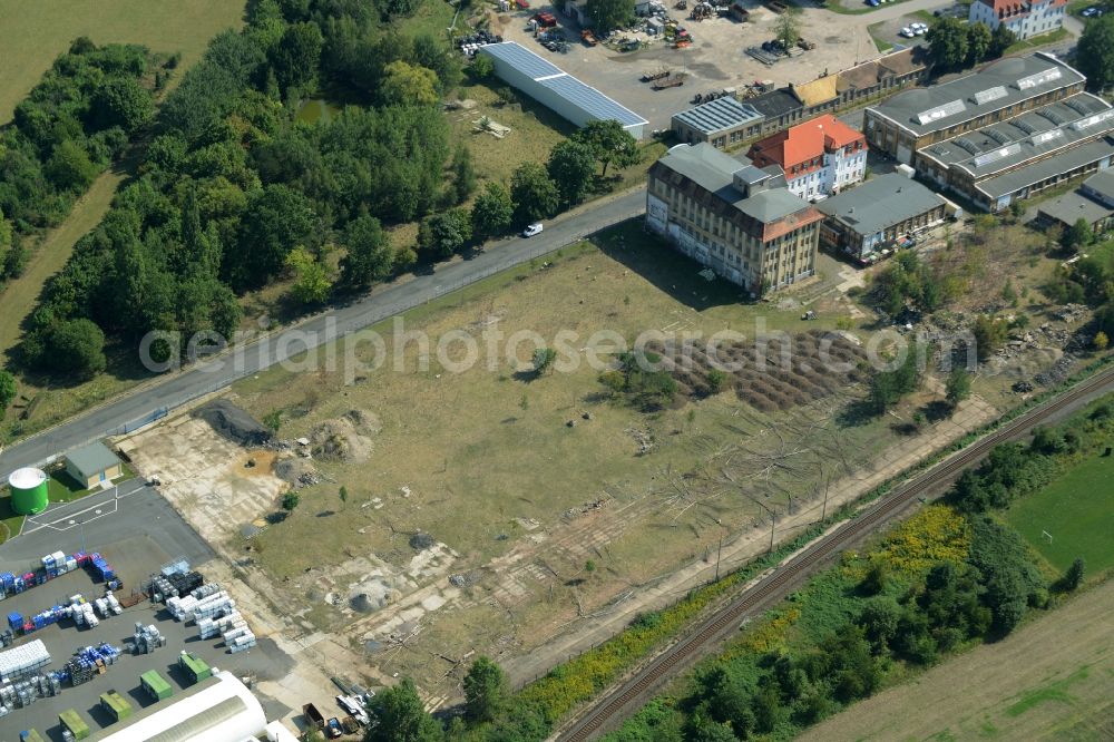 Aerial photograph Leipzig - Development area of industrial wasteland on Gutberlestrasse in Leipzig in the state of Saxony. The area is located in the Moelkau part and grown over with gras