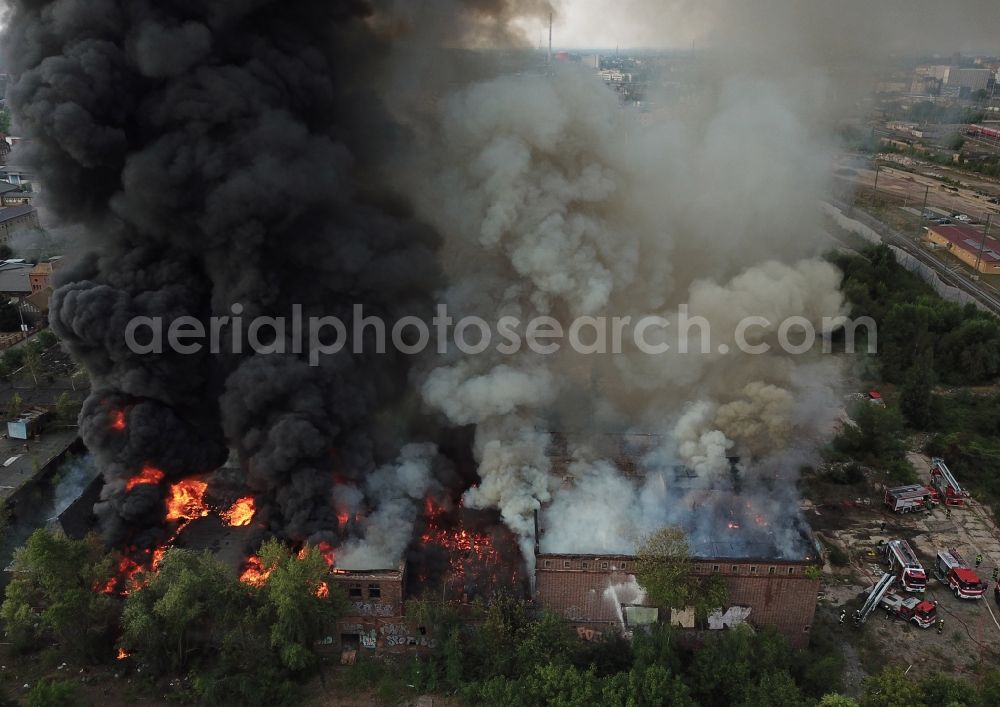 Halle (Saale) from the bird's eye view: Fire Ruin the buildings and halls of the alten Schlachthof on Freiimfelder Strasse in Halle (Saale) in the state Saxony-Anhalt, Germany