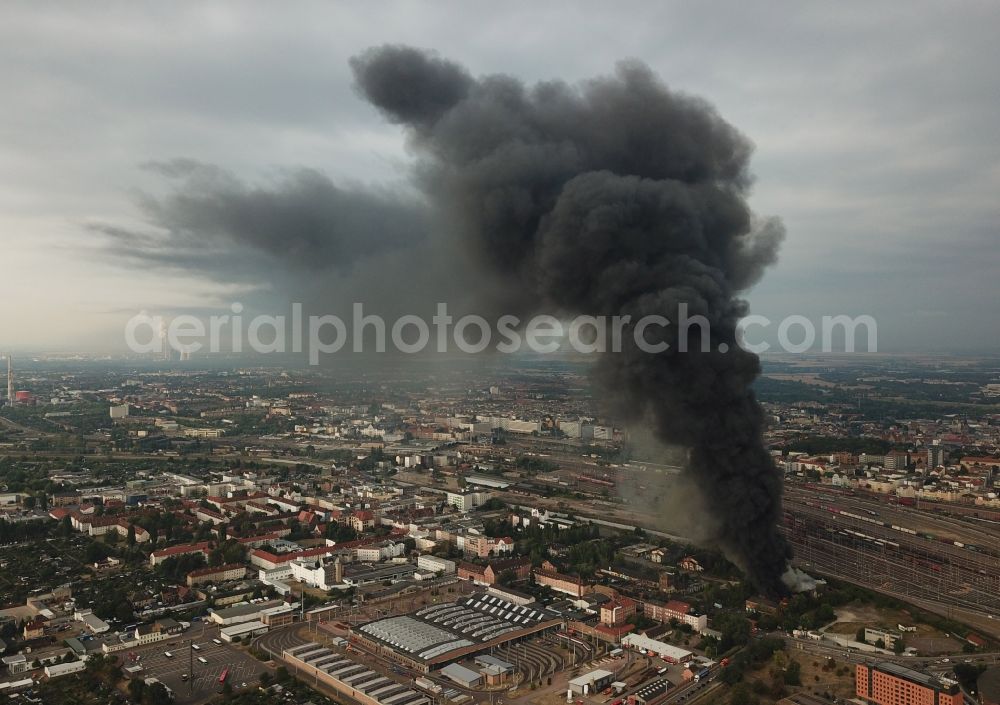 Aerial image Halle (Saale) - Fire Ruin the buildings and halls of the alten Schlachthof on Freiimfelder Strasse in Halle (Saale) in the state Saxony-Anhalt, Germany