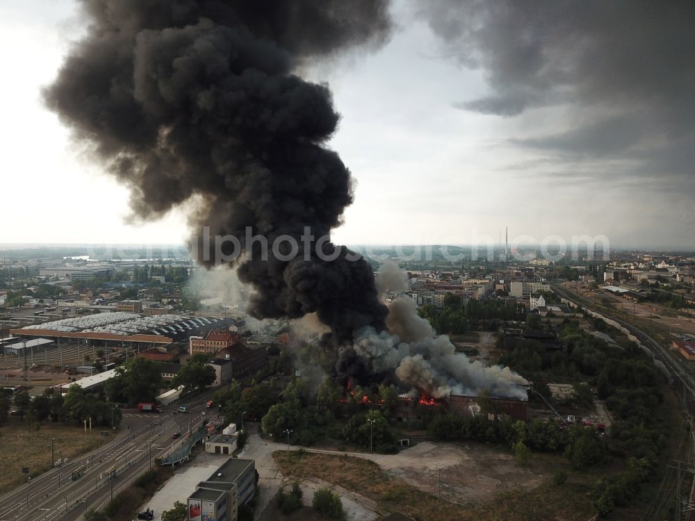 Halle (Saale) from the bird's eye view: Fire Ruin the buildings and halls of the alten Schlachthof on Freiimfelder Strasse in Halle (Saale) in the state Saxony-Anhalt, Germany