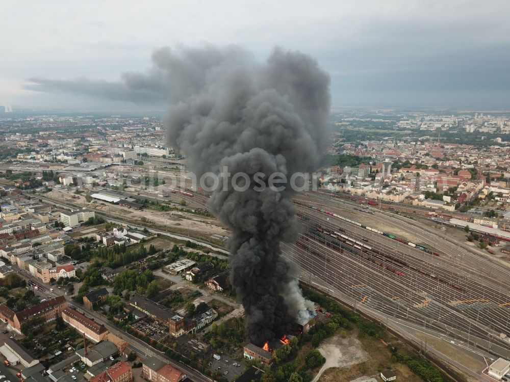 Aerial image Halle (Saale) - Fire Ruin the buildings and halls of the alten Schlachthof on Freiimfelder Strasse in Halle (Saale) in the state Saxony-Anhalt, Germany