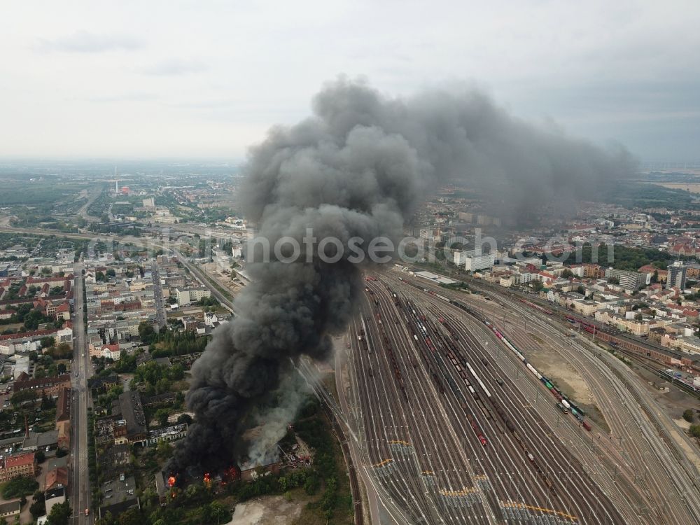 Aerial photograph Halle (Saale) - Fire Ruin the buildings and halls of the alten Schlachthof on Freiimfelder Strasse in Halle (Saale) in the state Saxony-Anhalt, Germany