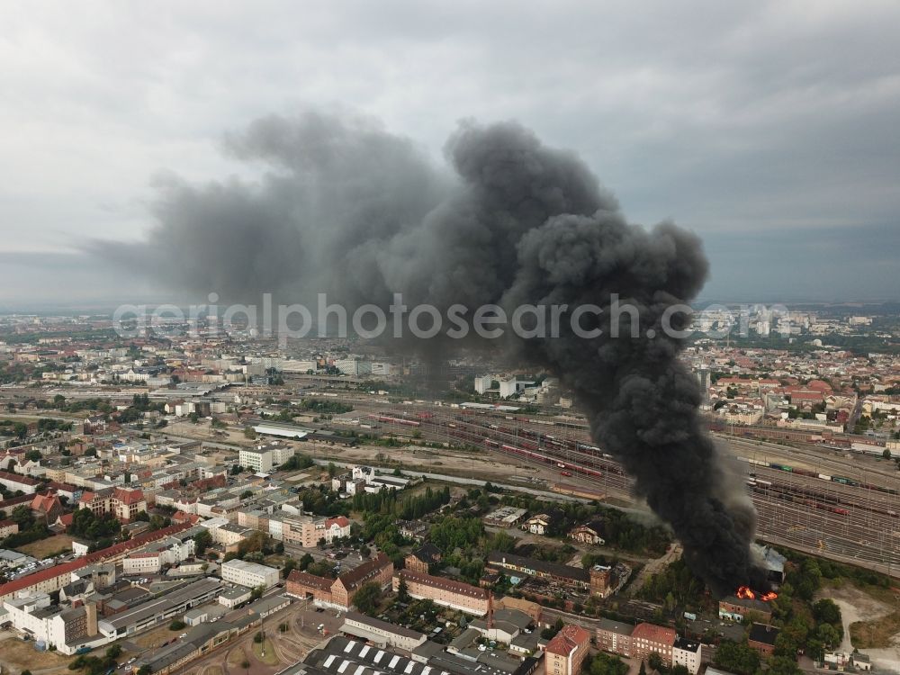 Halle (Saale) from the bird's eye view: Fire Ruin the buildings and halls of the alten Schlachthof on Freiimfelder Strasse in Halle (Saale) in the state Saxony-Anhalt, Germany