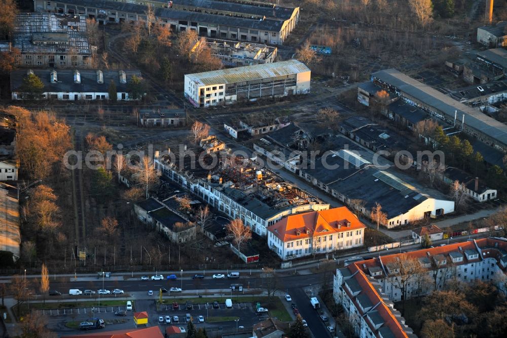 Berlin from above - Fire Ruin the buildings and halls of formerly GDR- company VEB Kuehlautomat on Segelfliegerdonm in the district Johannisthal in Berlin, Germany