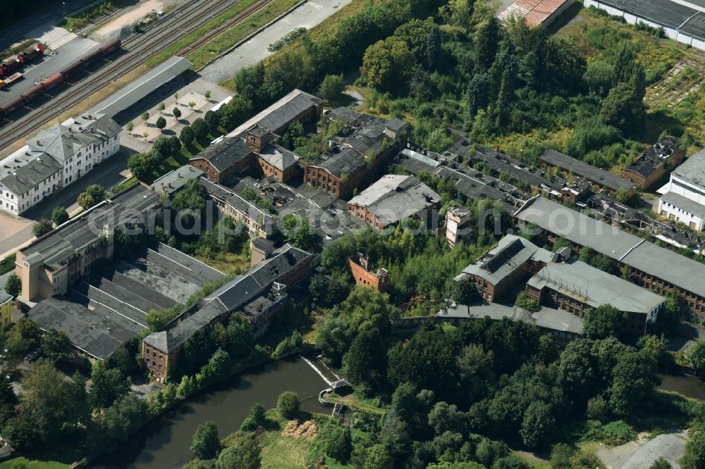 Oelsnitz/Vogtl. from above - Fire Ruin the buildings and halls of the former VEB Halbmond carpet works on Carl-Wilhelm-Koch-Strasse in Oelsnitz/Vogtl. in the state of Saxony