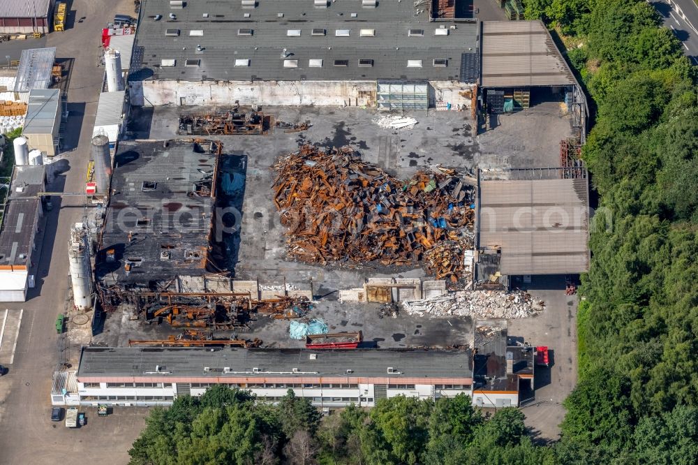 Witten from the bird's eye view: Fire Ruin the buildings and halls of the HP Pelzer Automotive GmbH on Brauckstrasse in the district Ruedinghausen in Witten in the state North Rhine-Westphalia