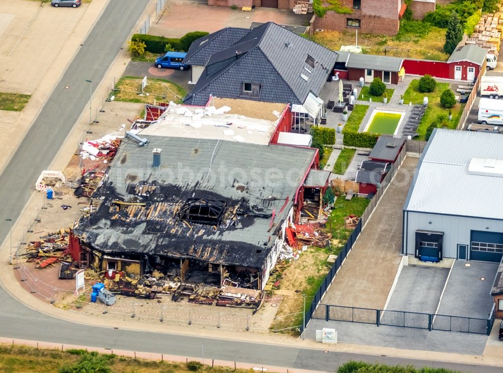 Hamminkeln from the bird's eye view: Fire- Ruins of Sauna- Clubs on Kesseldorfer Rott in Hamminkeln in the state North Rhine-Westphalia, Germany