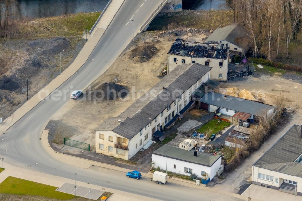 Arnsberg from the bird's eye view: Fire- Ruins Zu den factorystaetten in Arnsberg in the state North Rhine-Westphalia, Germany