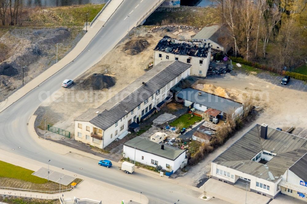 Arnsberg from the bird's eye view: Fire- Ruins Zu den factorystaetten in Arnsberg in the state North Rhine-Westphalia, Germany