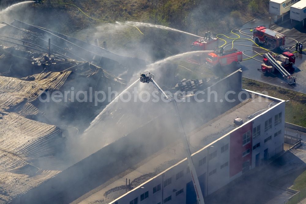 Sprockhövel from the bird's eye view: Fire in the premises of WKW Automotive in the industrial area Stefansbecke in Sprockhövel in the state of North Rhine-Westphalia