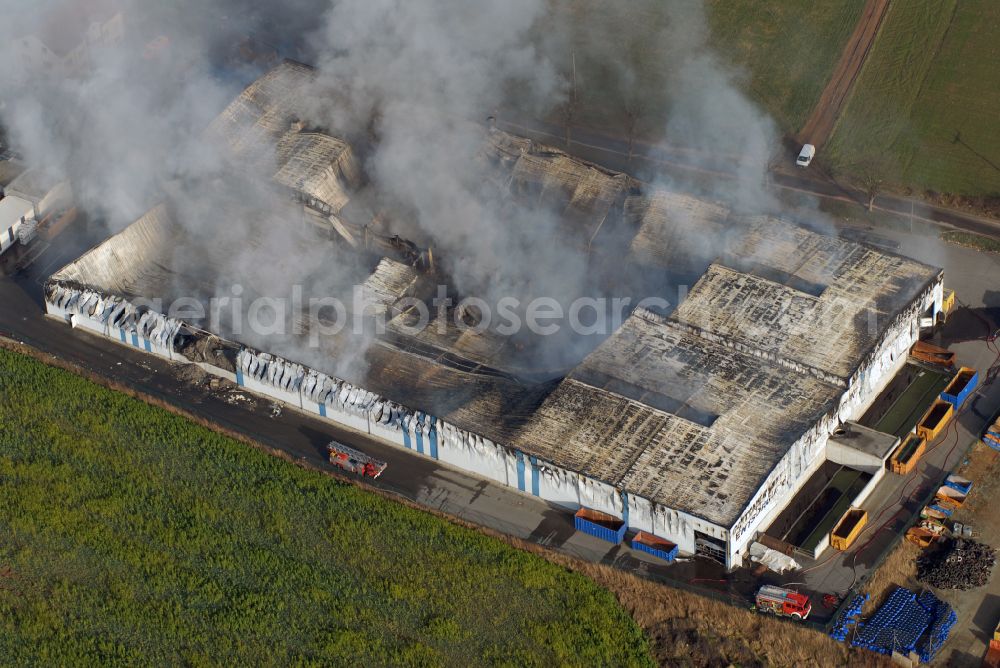 Schneidenbach from above - Fire exposure and smoke formation on the storage of Glitzner Entsorgung GmbH on street Weissensander Weg in Schneidenbach in the state Saxony, Germany