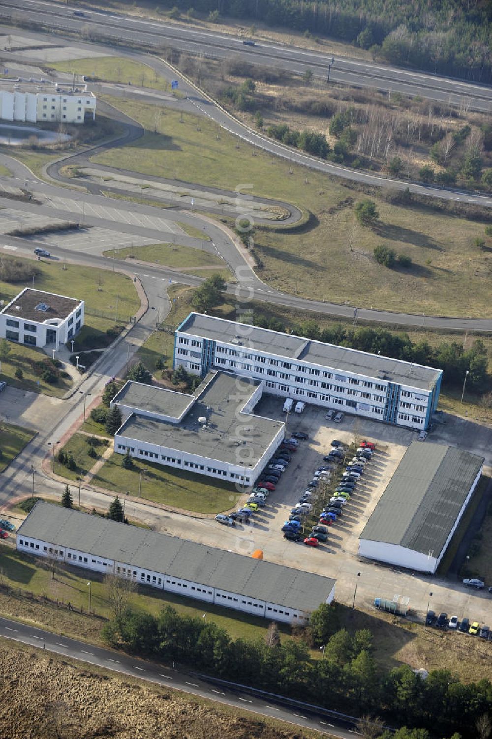 Aerial photograph STOLPE - Blick auf die Gebäude des Landesbetrieb Brandenburg Niederlassung Autobahn (ehem. Brandenburgisches Autobahnamt) in Stolpe an der Autobahn A 111 auf dem Gelände des ehemaligen Grenzübergang s zwischen Westberlin und der DDR. View of the Building of the motorway administration Brandenburg in Stolpe on the motorway A 111.